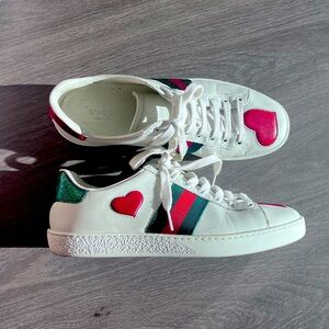Gucci authentic Ace Sneakers with hearts.